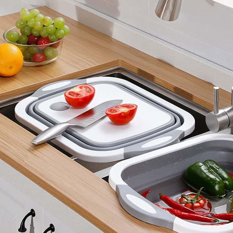 Tabla de cortar plegable con colador