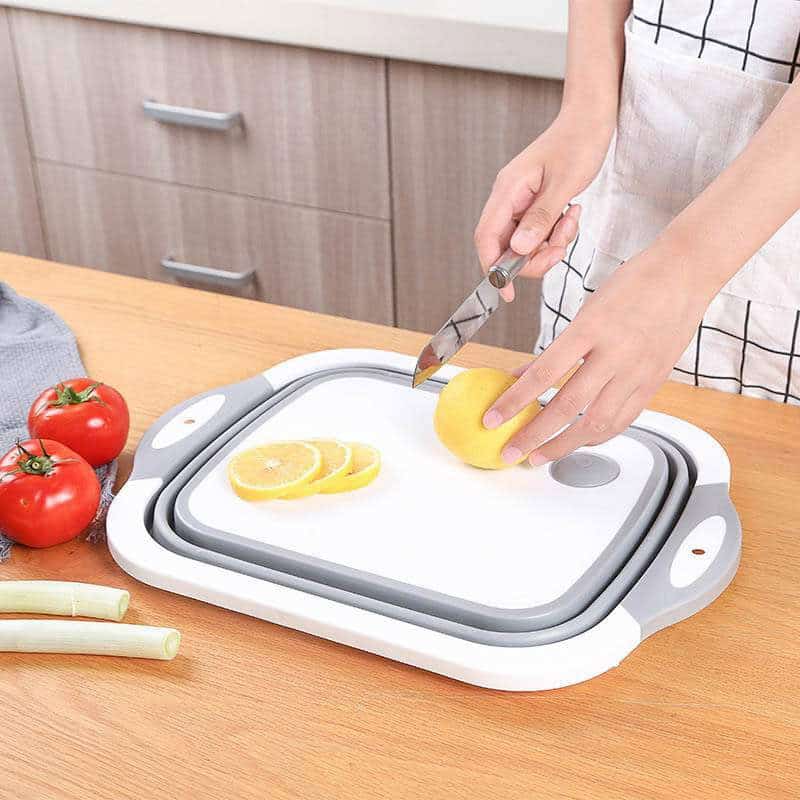 Tabla de cortar plegable con colador