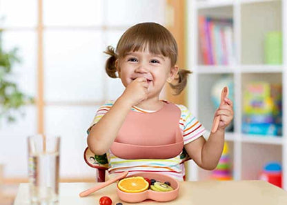 Babero de silicona con bolsillo recolector de comida